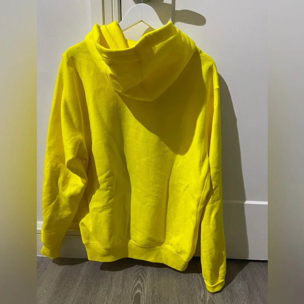 Noah NYC Yellow Hoodie with Black Logo and Red Cross - Picture 3 of 3